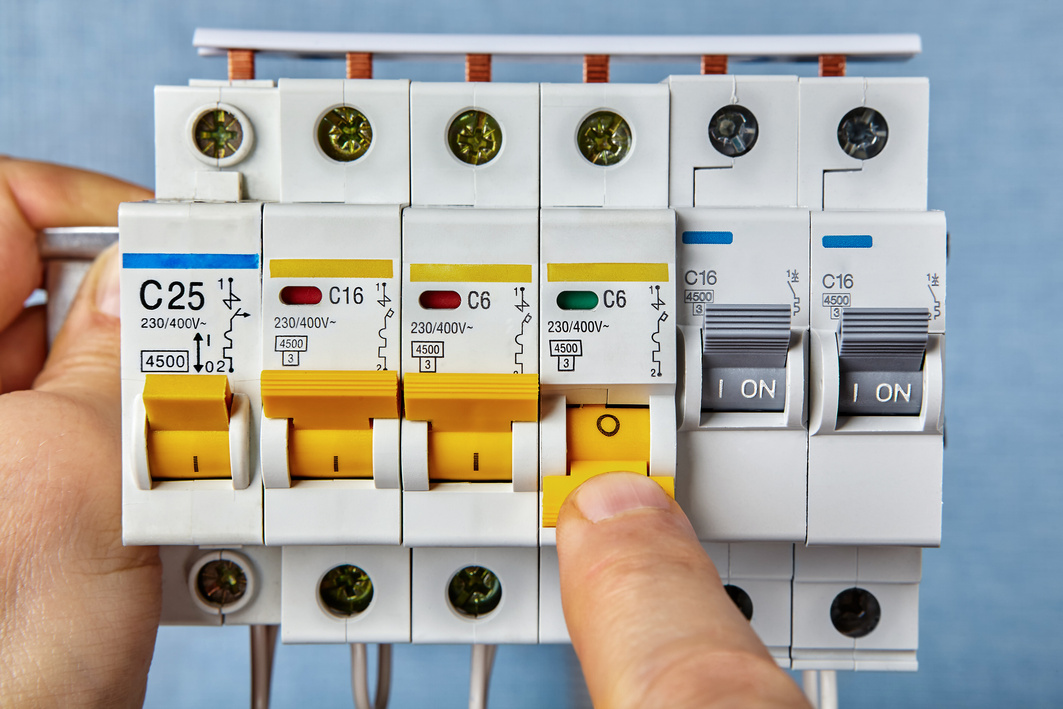 Installation of residential circuit breakers.